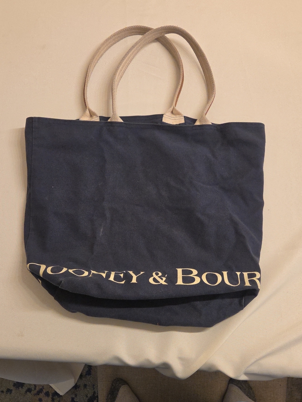 Dooney & Bourke Navy Canvas Tote with Cream Handles